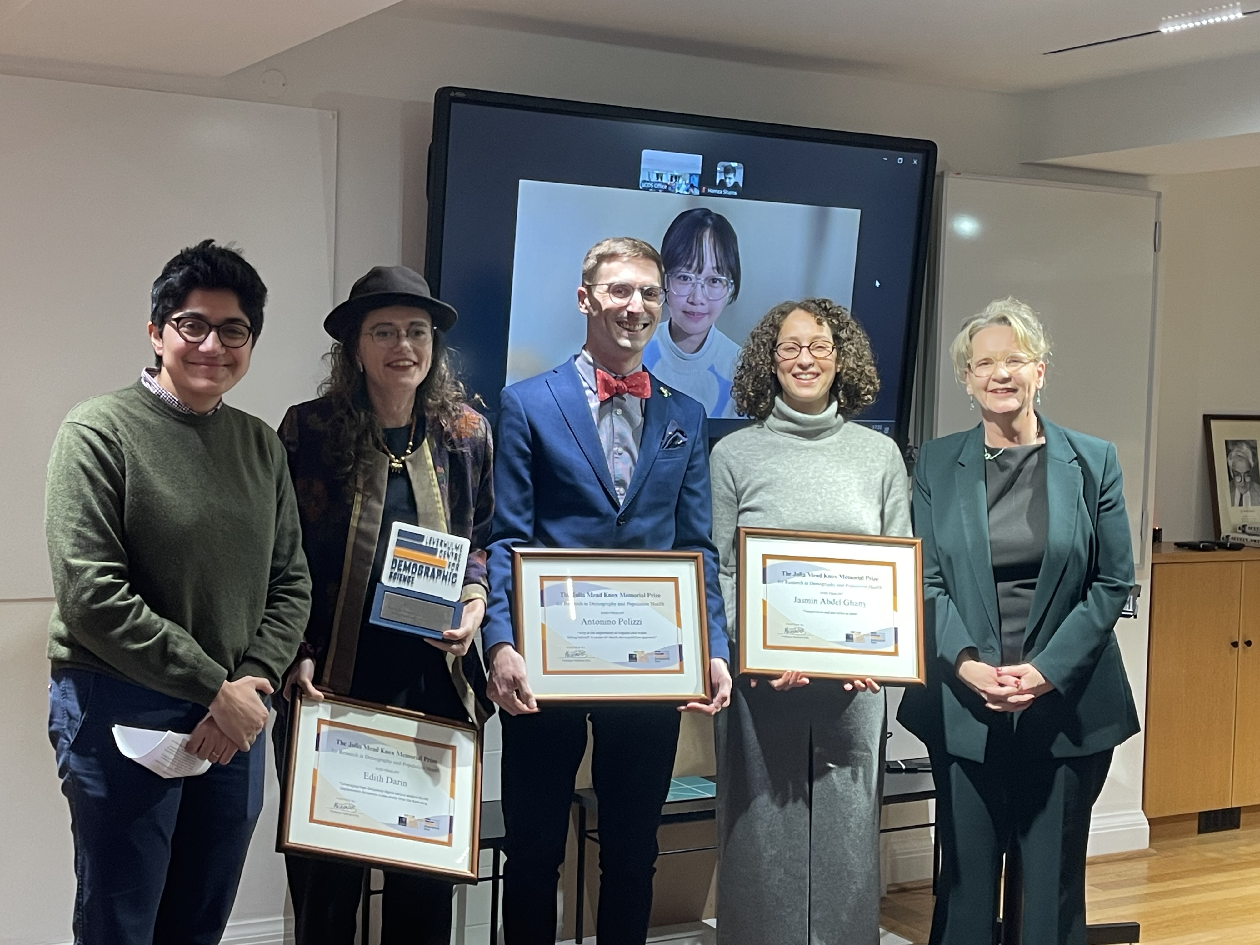 Award Ceremony pictured from left Jury Member Prof. Ridhi Kashyap, First Prize Winners Édith Darin and on screen Jiani Yan, Runners Up, Antonino Polizzi, Jasmin Abdel Ghany and Jury Member and Director LCDS, PhD supervisor Julia Mead Knox Prof. Melinda Mills