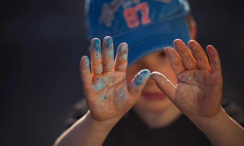 Child with dirty hands