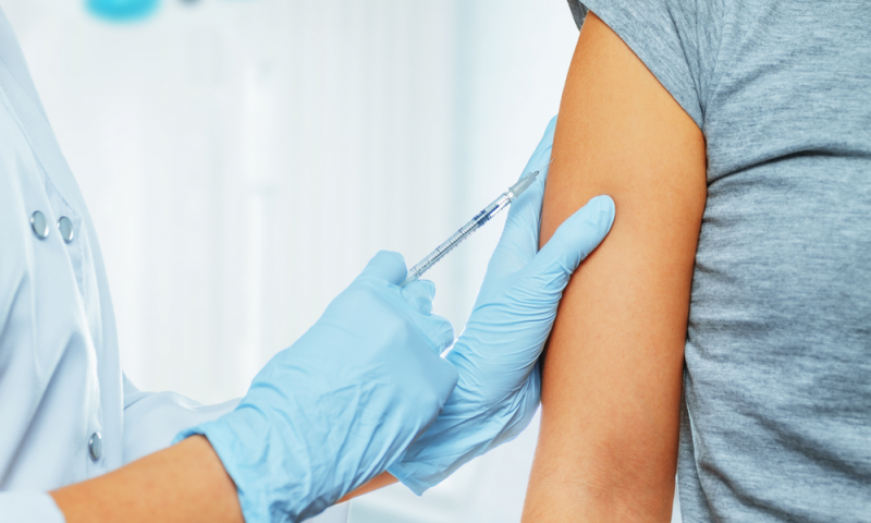 Woman receiving vaccine